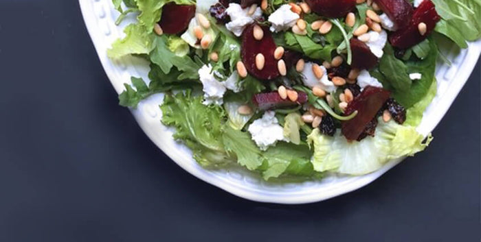 BEET, GOAT CHEESE, & PINE NUT SALAD WITH BALSAMIC POMEGRANATE DRESSING