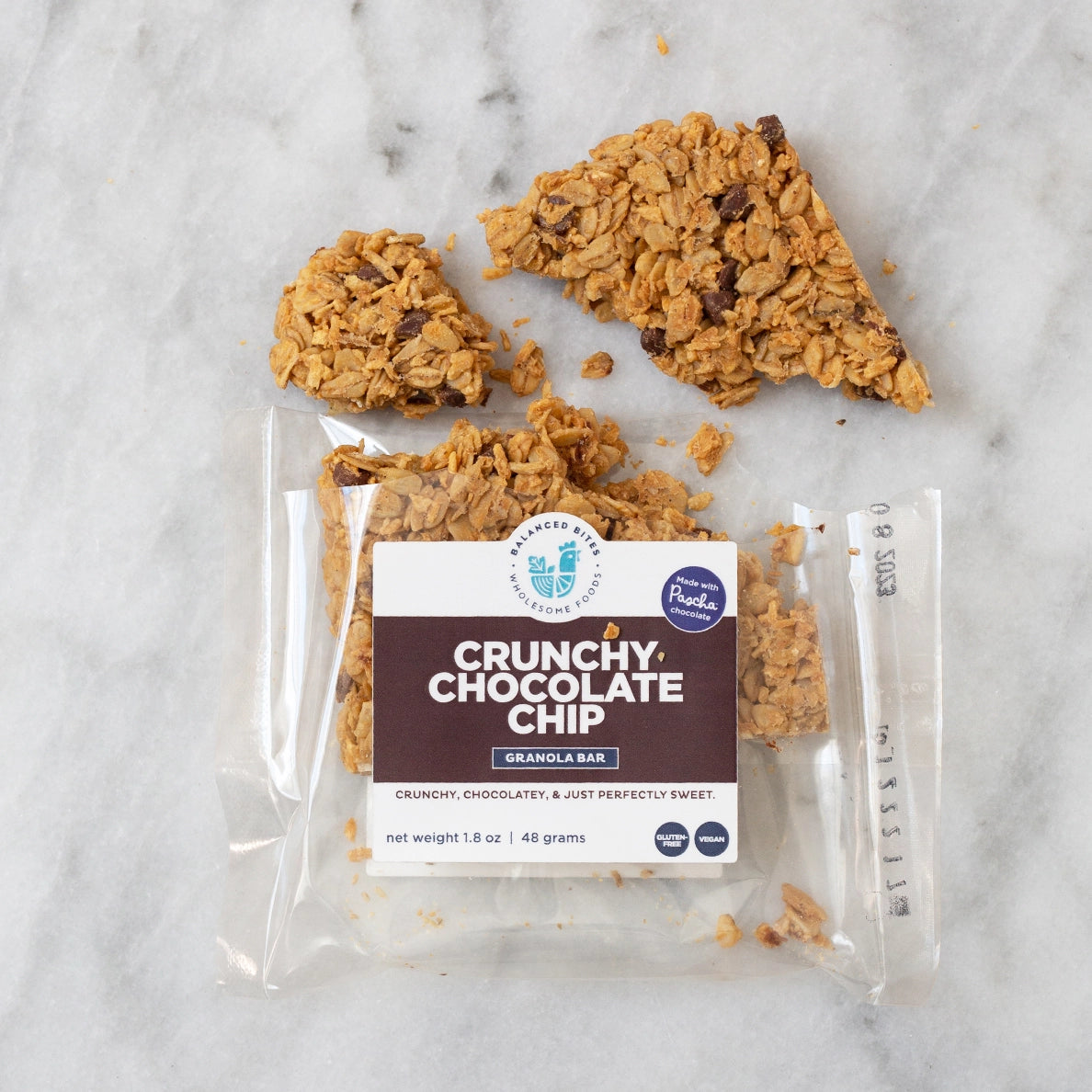 https://balancedbites.com/cdn/shop/products/Balanced-Bites-Granola-Bars-Crunchy-Chocolate-Chip-Pieces.webp?v=1660441212